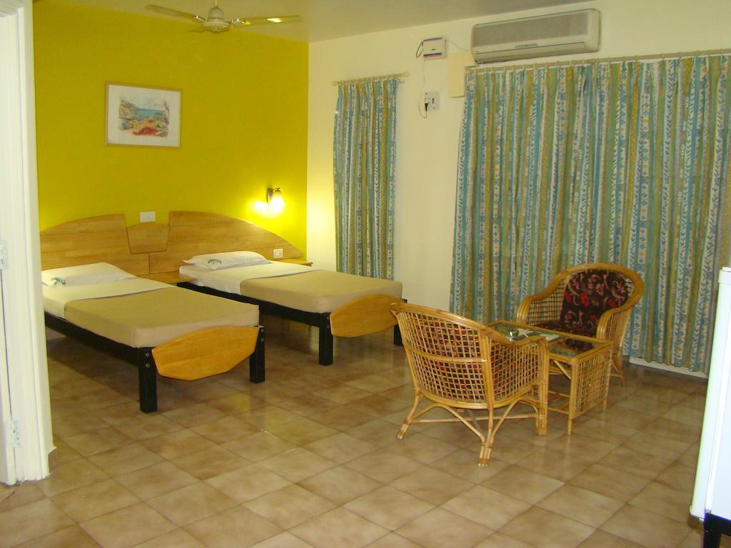 Tom'S Hotel Bangalore Zimmer foto